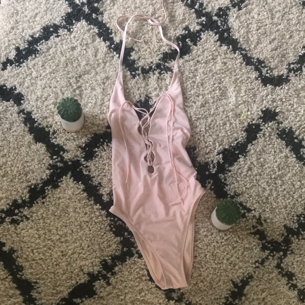 Cute/sexy one-piece with the tag still on!
